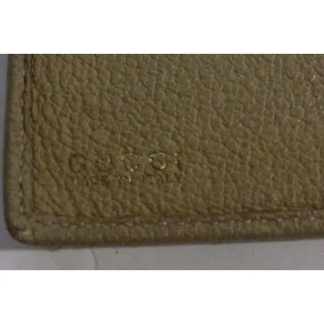 Vintage, Gucci, brown suede and leather, XL wallet with interior compartments, a bamboo and gold horse bit accent on the front