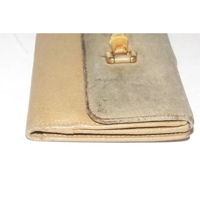 Vintage, Gucci, brown suede and leather, XL wallet with interior compartments, a bamboo and gold horse bit accent on the front